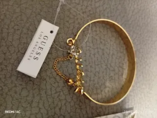 Bracciale Guess dorato con ciondolo