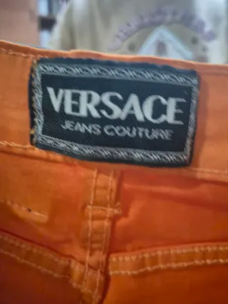 Pantalones Versace Naranja Talla  xs 2x1