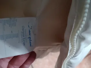 Piumino Champion con collo in volpe