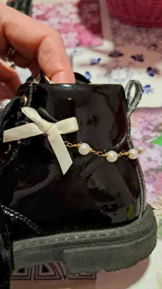 Tronchetto bambina nero con perle e fiocco