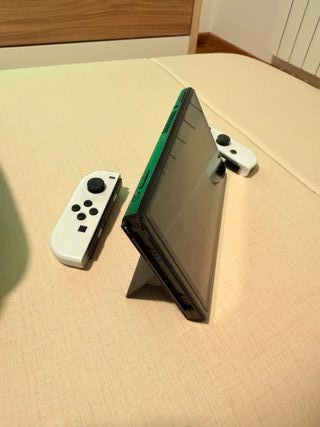 Nintendo Switch OLED Blanca y Negra con juegos