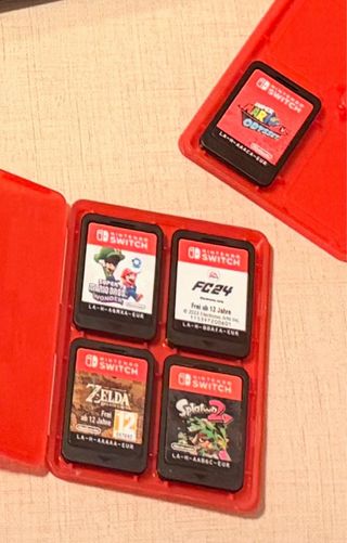 Nintendo Switch OLED Blanca y Negra con juegos