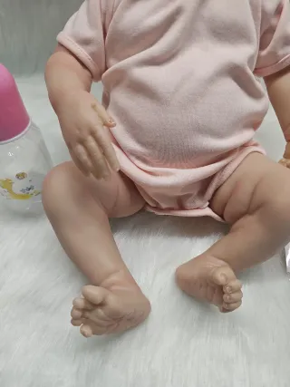 Bebé Reborn con Lazo Rosa