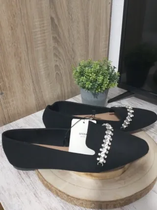 Mocasines negros con pedrería