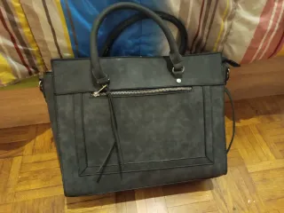 Bolso gris de mano no envío