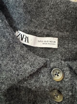 Jersey gris cuello polo botones