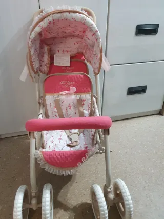 Carritos de muñecas gemelar rosa y rosa y fresa.