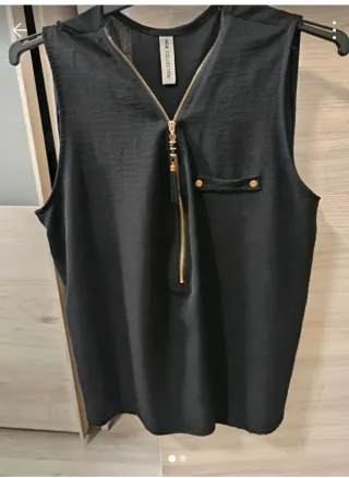 Blusa sin mangas con cremallera