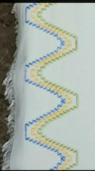 Mantelería antigua bordada