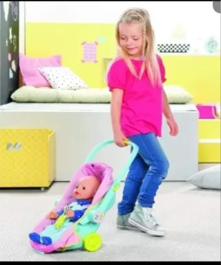Portabebés y cochecito para muñeca