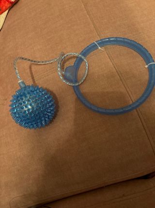 Juguete saltarín aro y pelota azul