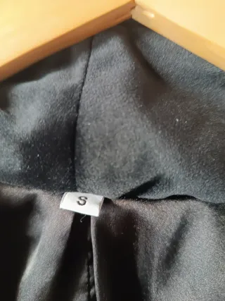 Chaqueta fiesta negra y dorada.