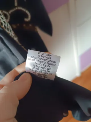 Chaqueta fiesta negra y dorada.