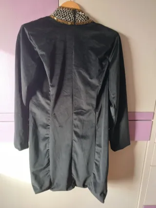 Chaqueta fiesta negra y dorada.