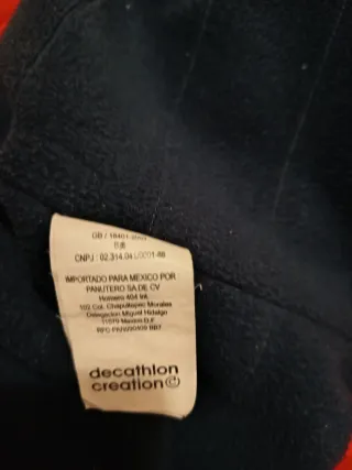 Giacca da sci rossa Tribord e salopette Diadora