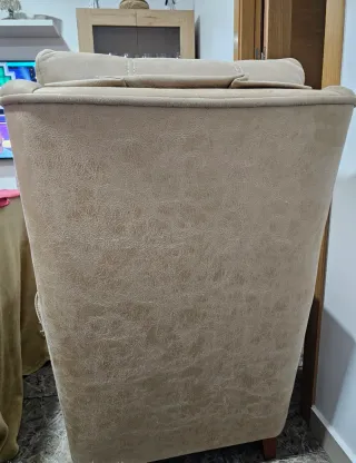 Sillón de tela beige