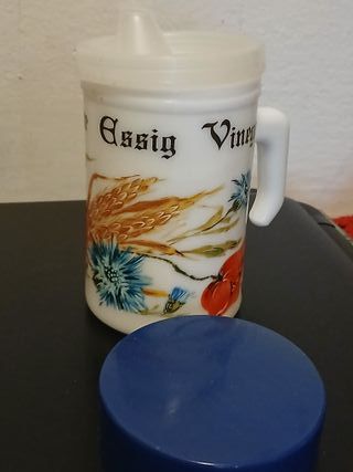 Aceto Arcopal con fiore rosso