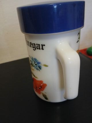 Aceto Arcopal con fiore rosso