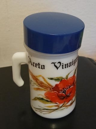 Aceto Arcopal con fiore rosso