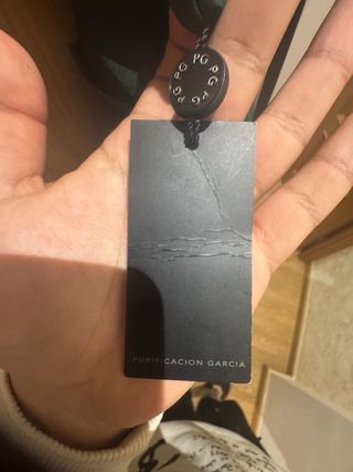 Vestido Purificación García verde con etiqueta