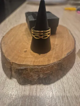 Anillo acero líneas infinito dorado ajustable