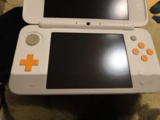 Nintendo 2DS XL Naranja y Blanco