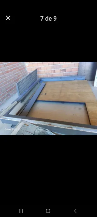 Puerta de garaje abatible gris