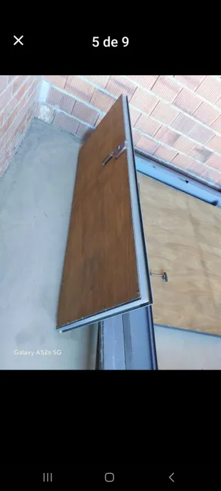 Puerta de garaje abatible gris