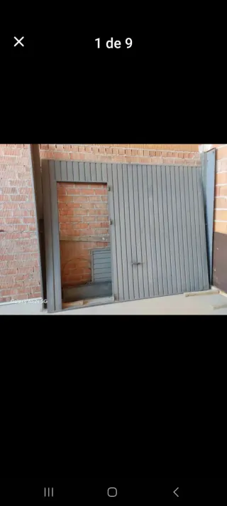 Puerta de garaje abatible gris