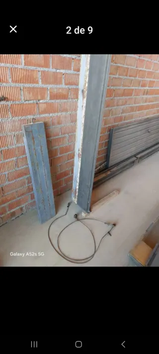 Puerta de garaje abatible gris