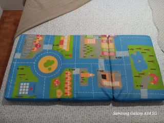 Cuna de viaje plegable naranja y negra