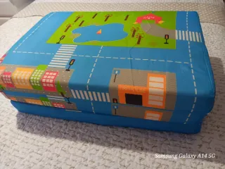 Cuna de viaje plegable naranja y negra