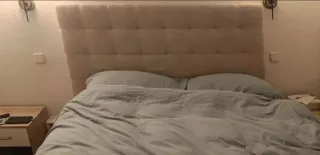 Cama canapé con cabecero tapizado