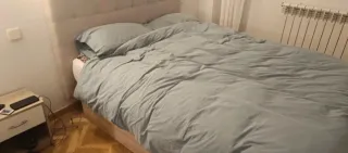 Cama canapé con cabecero tapizado