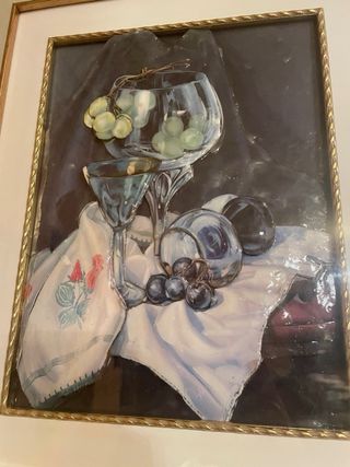 Bodegón en relieve con marco dorado