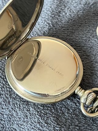 Reloj de bolsillo Zenith antiguo con cadena