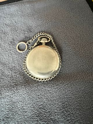 Reloj de bolsillo Zenith antiguo con cadena