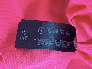 body basico fucsia manga corta