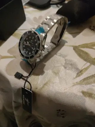 Reloj Negro de la marca ricecgo tiene su caja