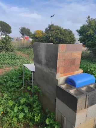 Barbacoa de obra ladrillo y cemento