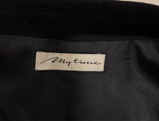 Traje de chaqueta y pantalón negro