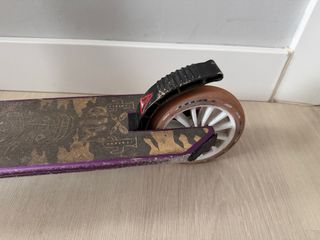 Patinete Oxelo morado 6-9 años