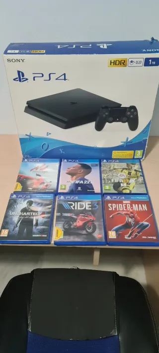 Consola Sony PS4 1Tb +2 mandos+ 6 Juegos.