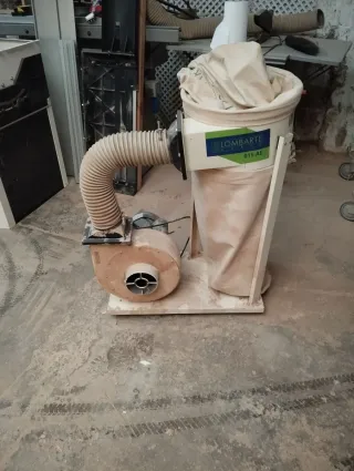 Sierra de mesa con aspirador