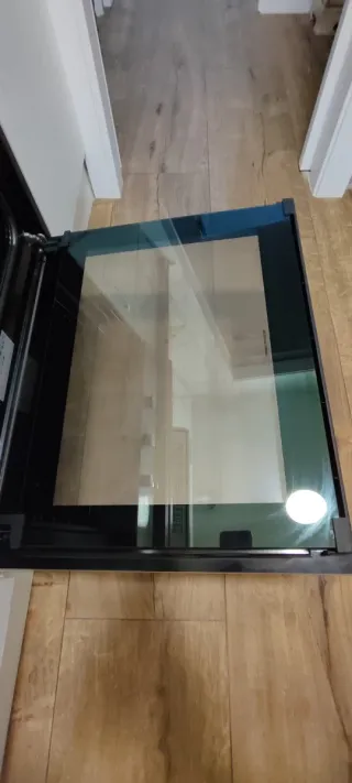 Placa de cocina a gas negra y horno eléctrico