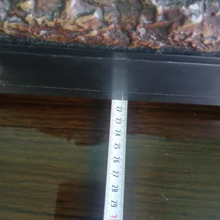 Escultura de bronce de cupido