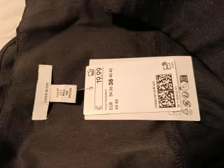 Falda H&M gris plisada