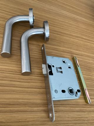 Manilla y cerradura acero inoxidable