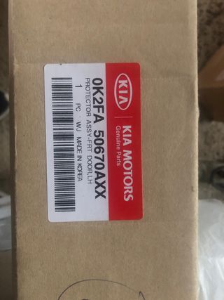 KIA CARENS 2006 ,Embellecedor puerta conductor