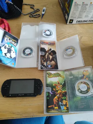 PSP Sony Nera + 4 Giochi